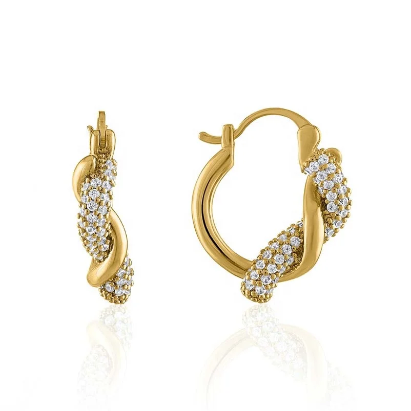 

Gemnel modern vintage design element interlocking gold and pave detailing diamond knot interlace gold hoop earring