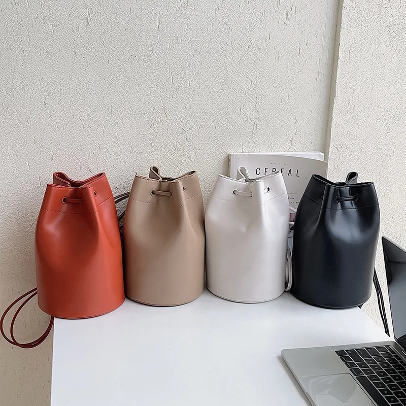 

Women's Korean version of the new fashion creativity cross-body bag shoulder bag pull rope pleated cylinder bucket bag