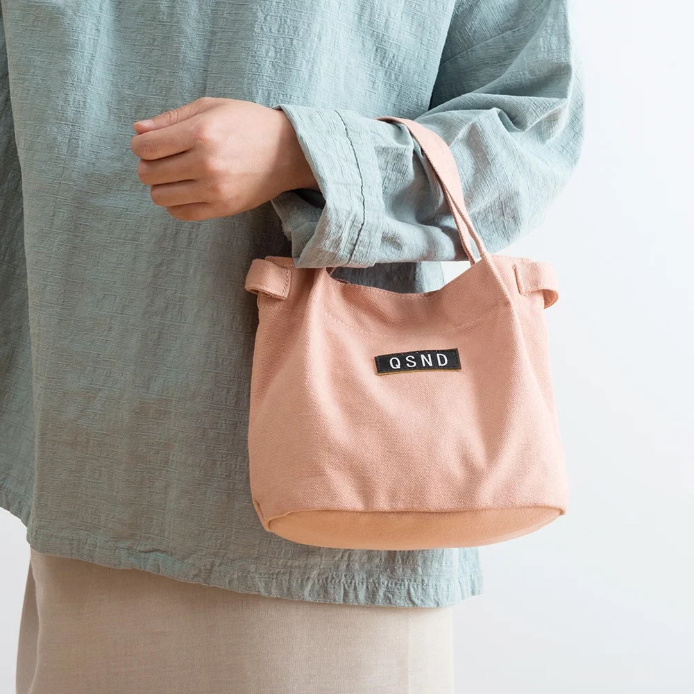 

Factory price pure colors letters logo casual style canvas bucket bags women handbags 2020