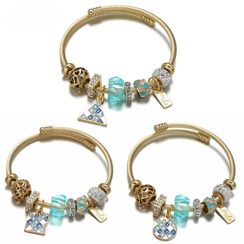 

Stainless Steel Gold Plated Hollow Heart Beads Cable Bangle Blue Crystal Charm Bracelet Bangle