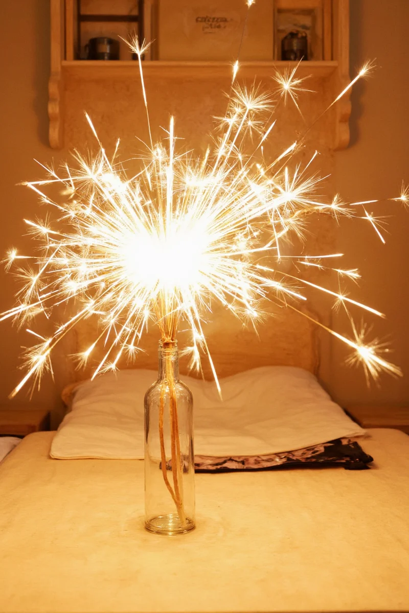 Fairy string lights wrapped around a bunk bed