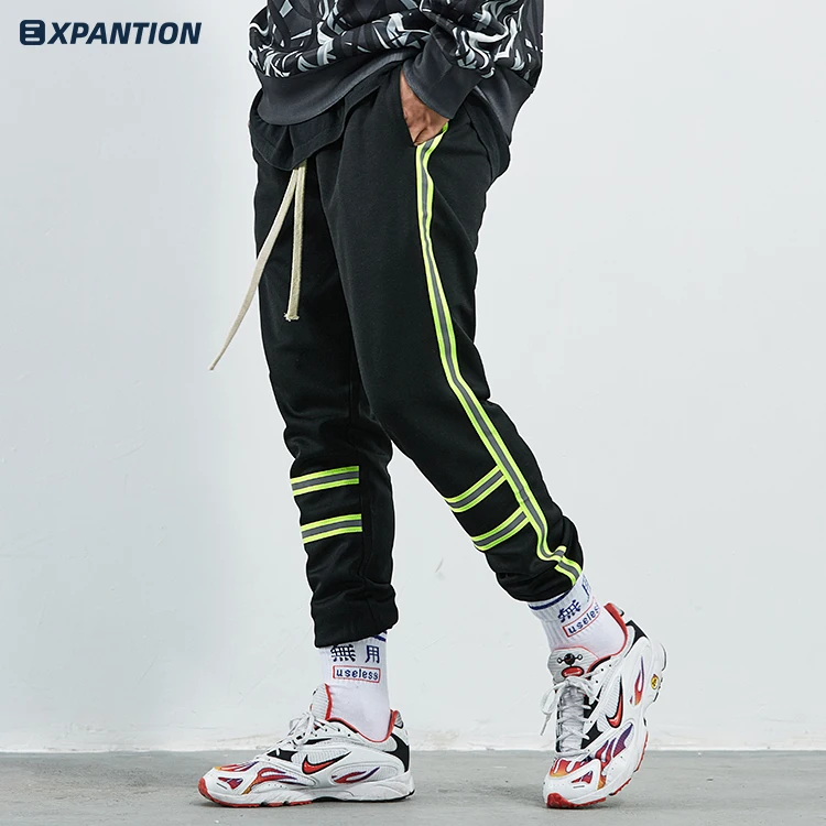 

2020 Wholesale mens fashion jogger 3M reflective track pants custom logo cut and sew print stripe sweatpants street jogger, Multi