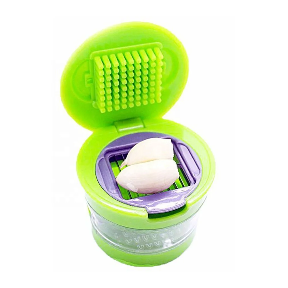 

Garlic Chopper Slicer Grater Miniature Alligator Press for Soft Vegetables, Nuts, Foods. Two Interchangeable Blades, Green