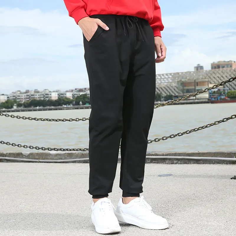 

Wholesale Fashion Drawstring 100%Cotton Casual Sweat Pants Loose Men's Harem Pants Black Plus Size Trousers