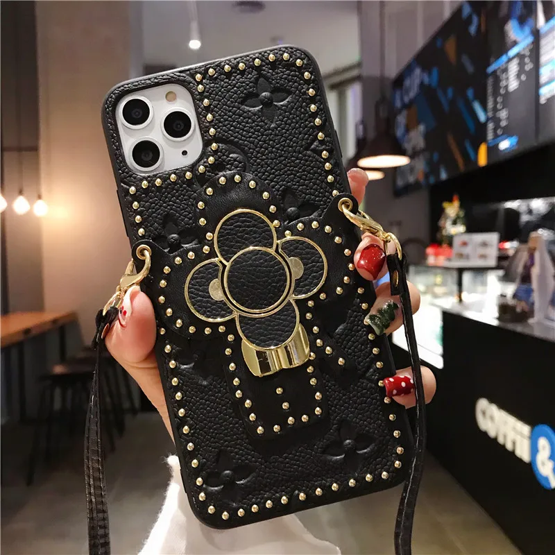 

Luxury Flower Rivet Genuine Leather Back Phone Case For iPhone 12 12 Pro With Strap