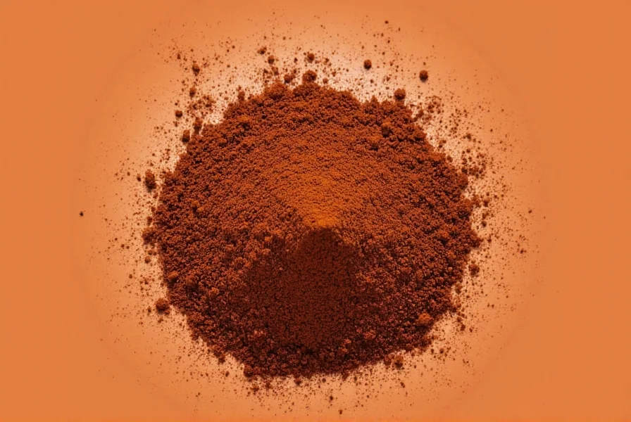 Bowl of red marinade with ancho pepper powder