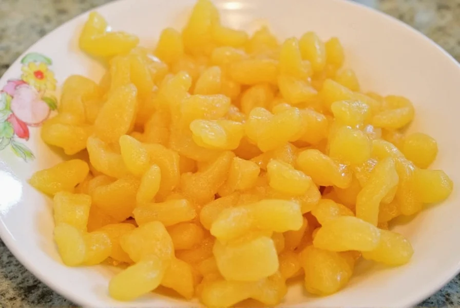 Step-by-step process of making candied ginger from fresh root to finished product