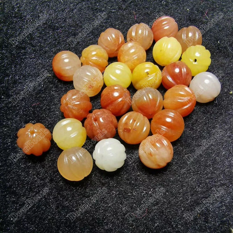 

Hot Selling Unique New Carved Pumpkin Gemstone Stone 10mm Yellow Jade Beads for Jewelry Making