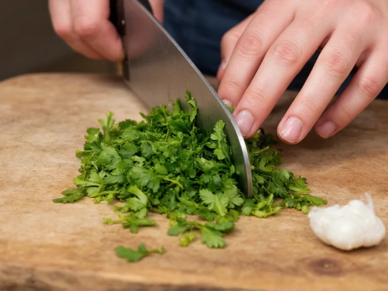 Hand chopping fresh parsley for chimichurri sauce