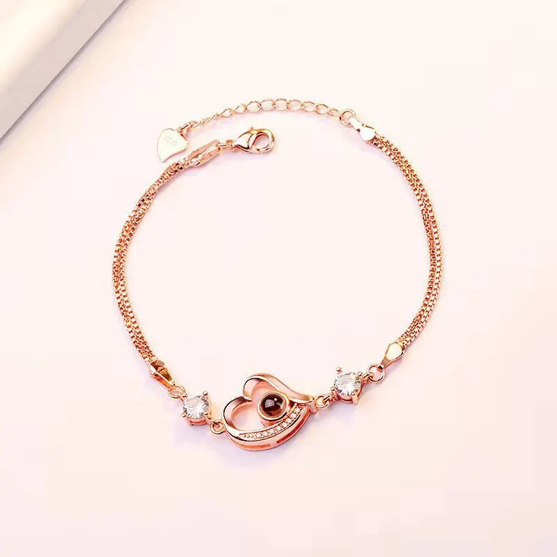 

2021 Rose Gold Plated I Love You 100 Languages Projection Crystal Heart Romantic Jewelry Chain Pendant Bracelet for Women Gift