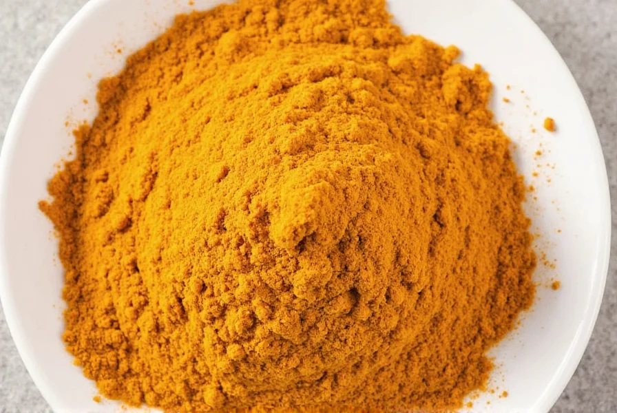 Turmeric, cumin, and cayenne peppers on a counter