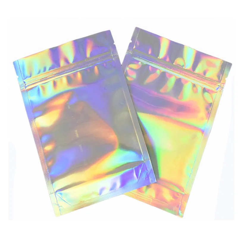 

In Stock 10X15Cm One Side Transparent Clear Front Custom Cosmetic Hologram Silver Backed Plastic Packaging Mylar Ziplock Bag