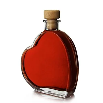Wholesale Stocked 200ml Heart Shaped Empty Liquor Glass Bottle With