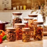 

Chinese Professional Supplier Cylindrical Custom Logo Spice Clear Glass Jar with Bamboo Lid