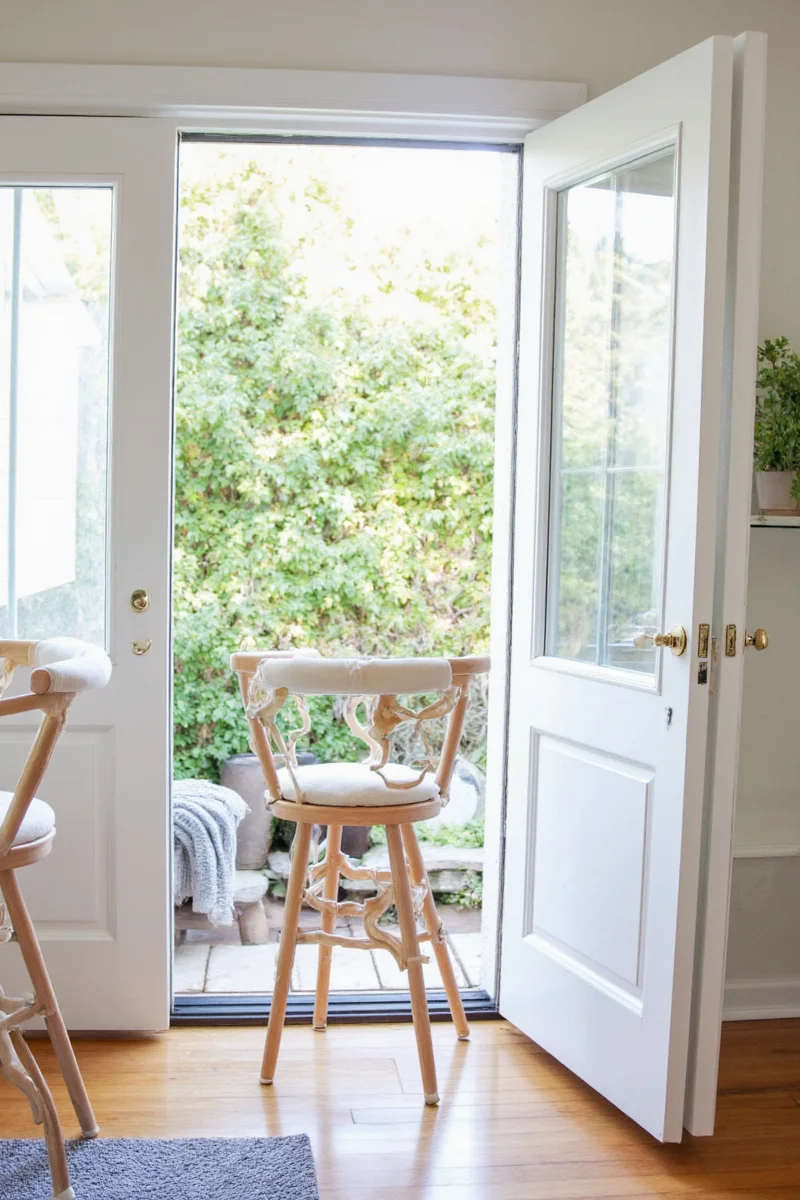 Sunny playroom lit by French doors
