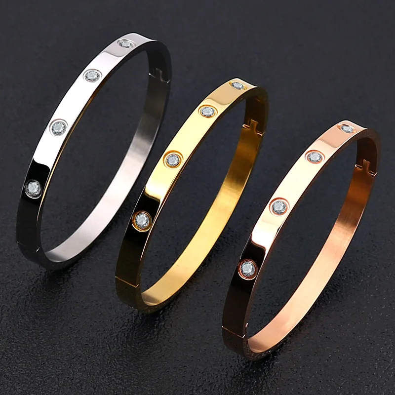 

Wholesale Hot Fashion 18K Gold Plated Stainless Steel Clasp Zircon Engraved Bracelets For Women Cuff Open Bangle Diamond Bangle, Picture shows