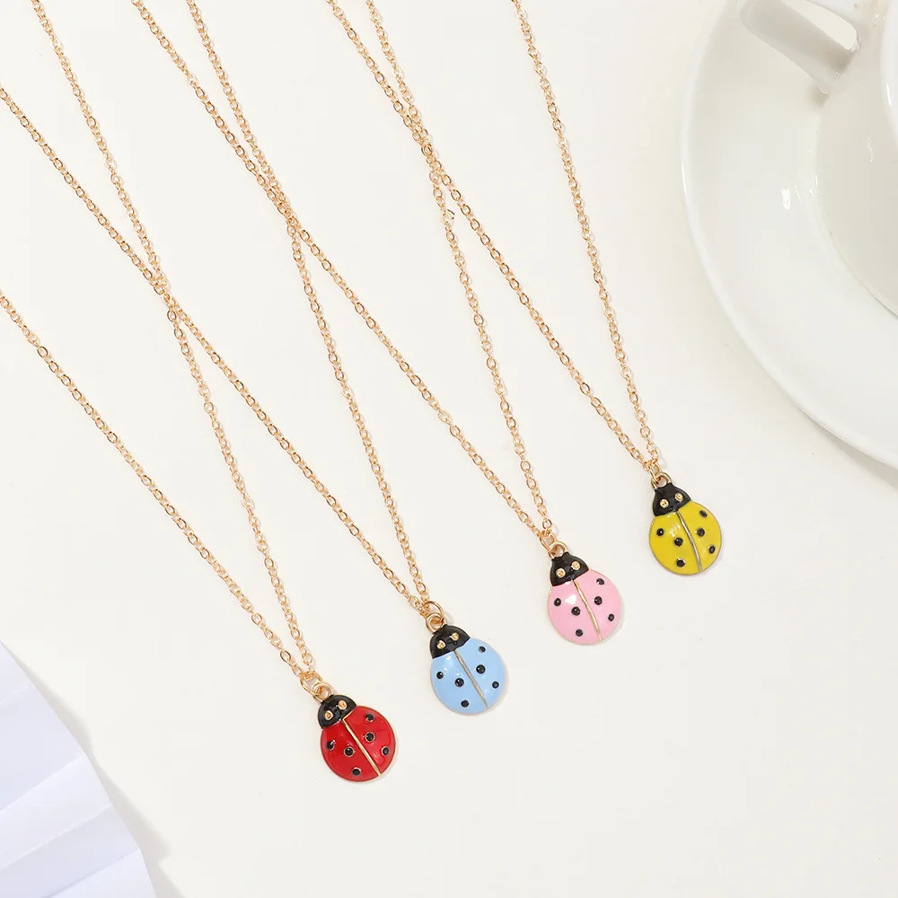 

Wholesale Gold Plated Clavicle Chain Four Color Cartoon Magic Ladybug Pendant Necklace For Women, As picture