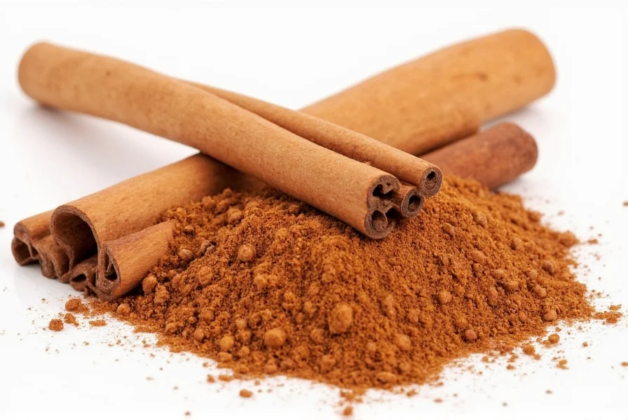 Close-up of cinnamon sticks and ground cinnamon with measuring spoon