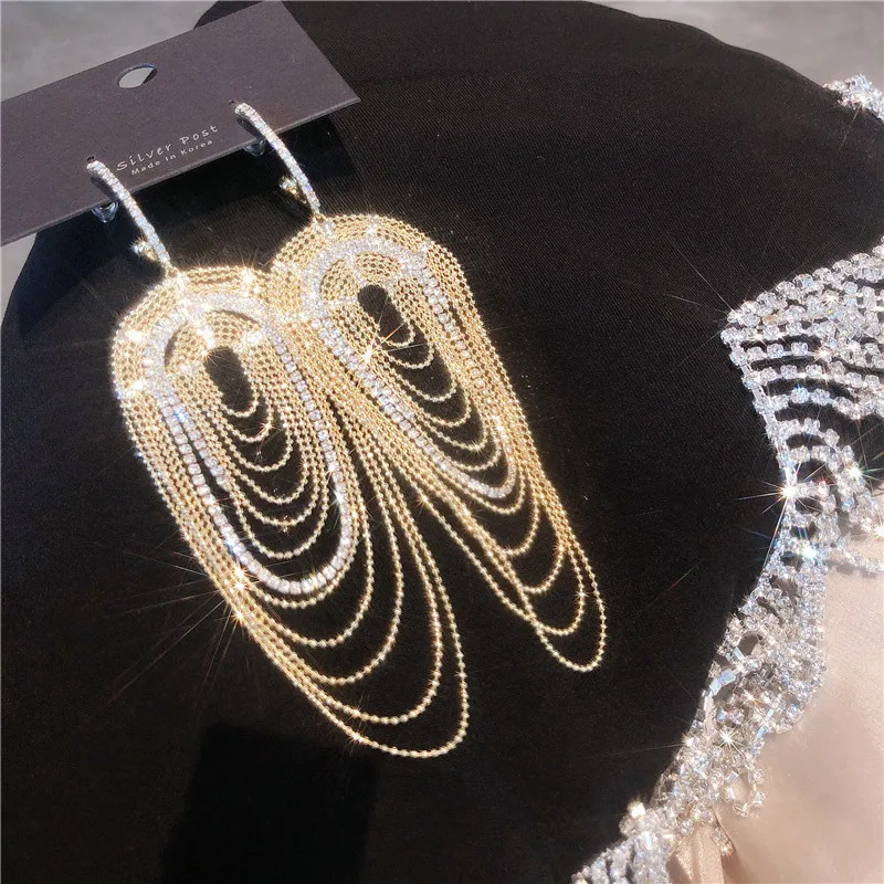 

Women's earrings heavy industry temperament bright geometric ellipse multilayer catch chain ear line long earrings