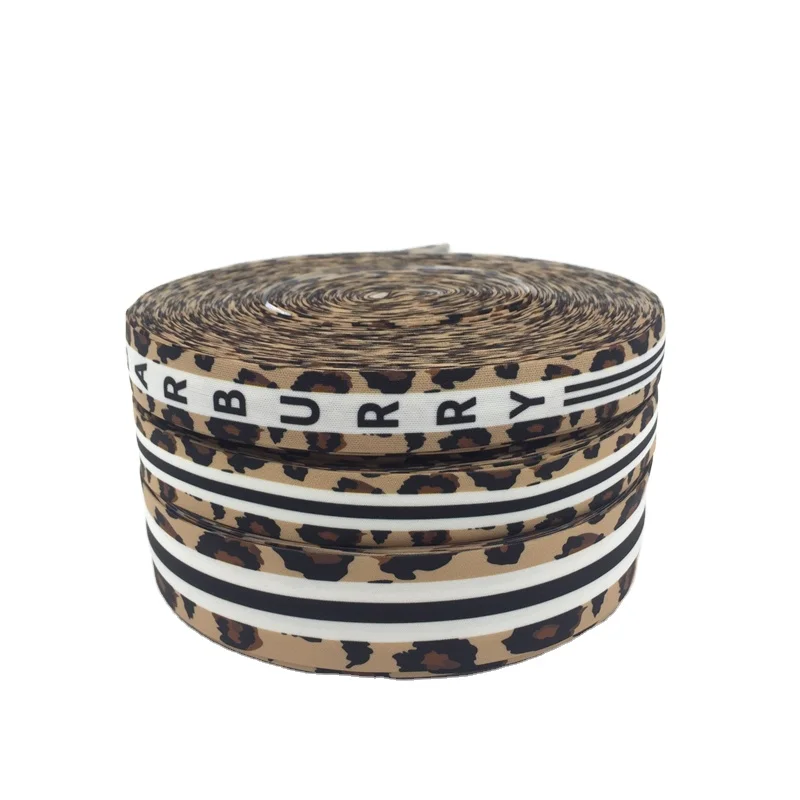 

Leopard print black and white flat ribbon poly tape for sleepper upper polyester webbing for dog color special webbing