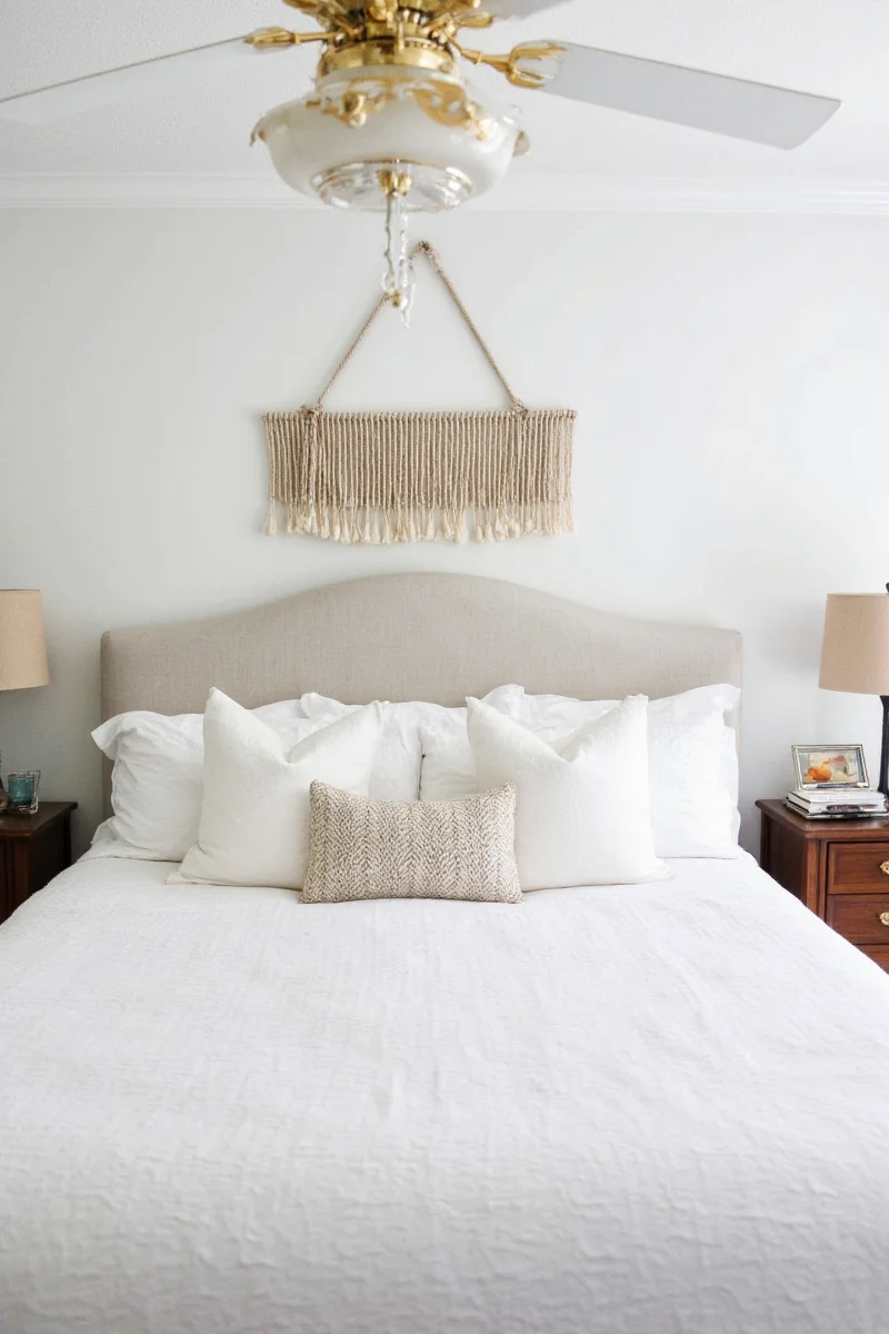 7 genius above the headboard decor ideas for a family friendly bedroom makeover