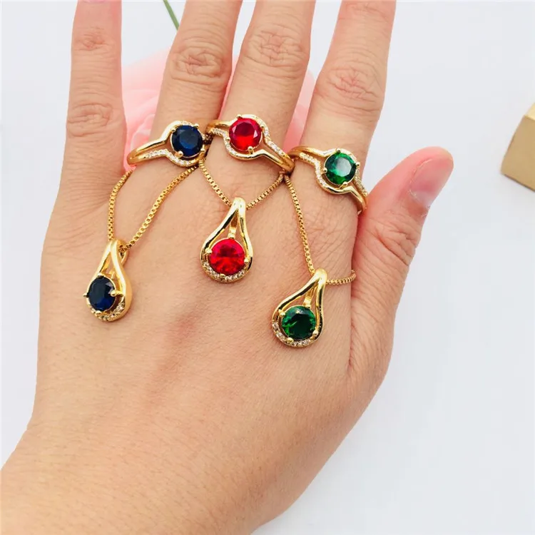 

Vietnam Sand Gold Jewelry Brass Gold Plated Jewelry Drop Shape Round Gemstone Pendant Ring Women'S Fashion Set