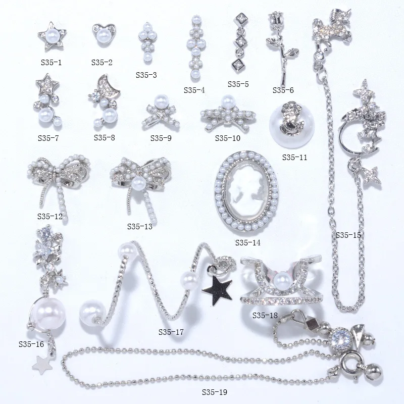 

Luxury Nail Arts AAA Zircon White Pearl Bow Star Rose Flower Long Chain Love Heart Nail Charms Women Finger Nail Jewelry, Colorful