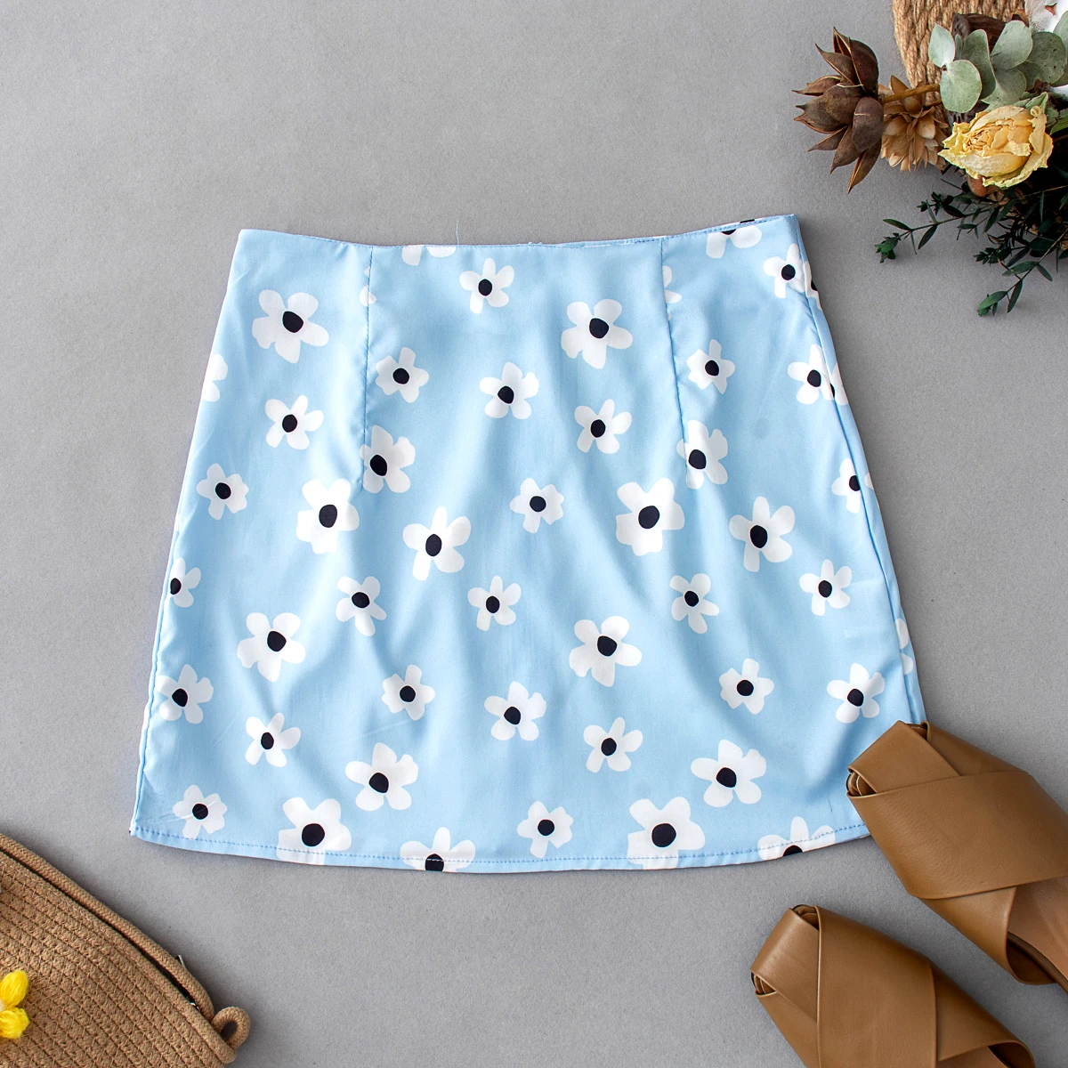 

Zipper fly light blue color floral print stylish design ladies fashion summer short mini skirt