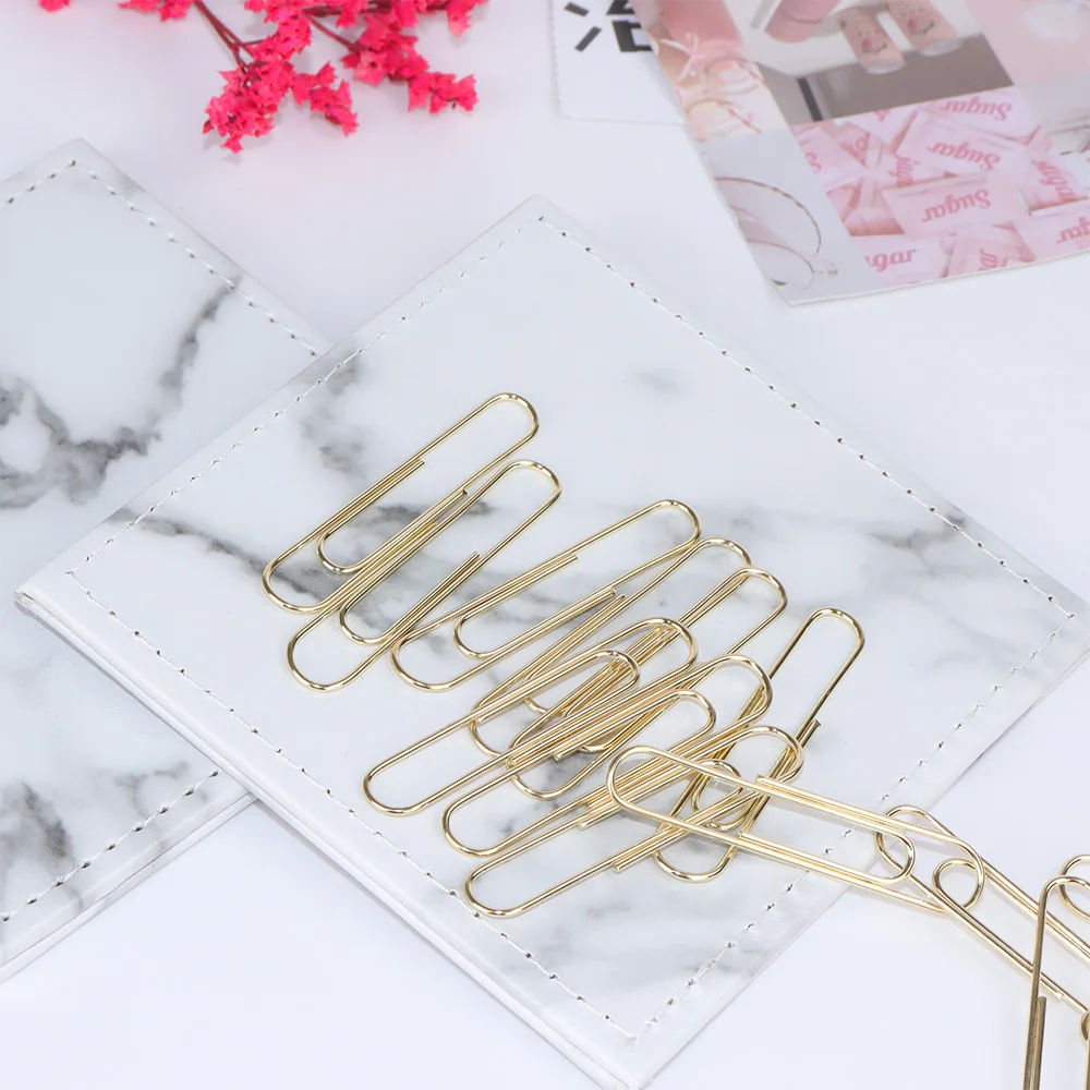 gold paper clips 50mm.jpg