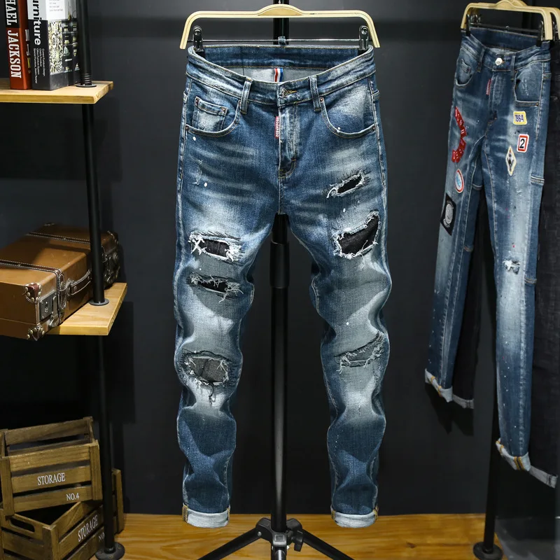 

Hot sale new men fashion jeans biker denim pant wild denim fabric distressed spray paint ripped slim fit patched pants jeans