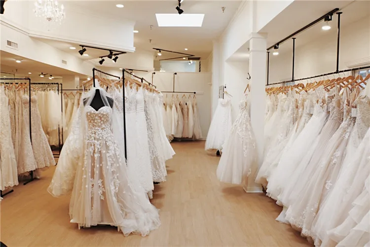 Boutique Bridal Store Clothing Stands Decoration Of Wedding Dresses