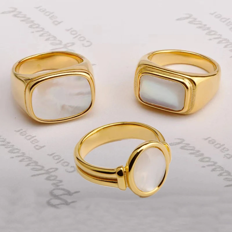 

ins Wind titanium steel plated 18K gold oval curved white shell stainless steel ring