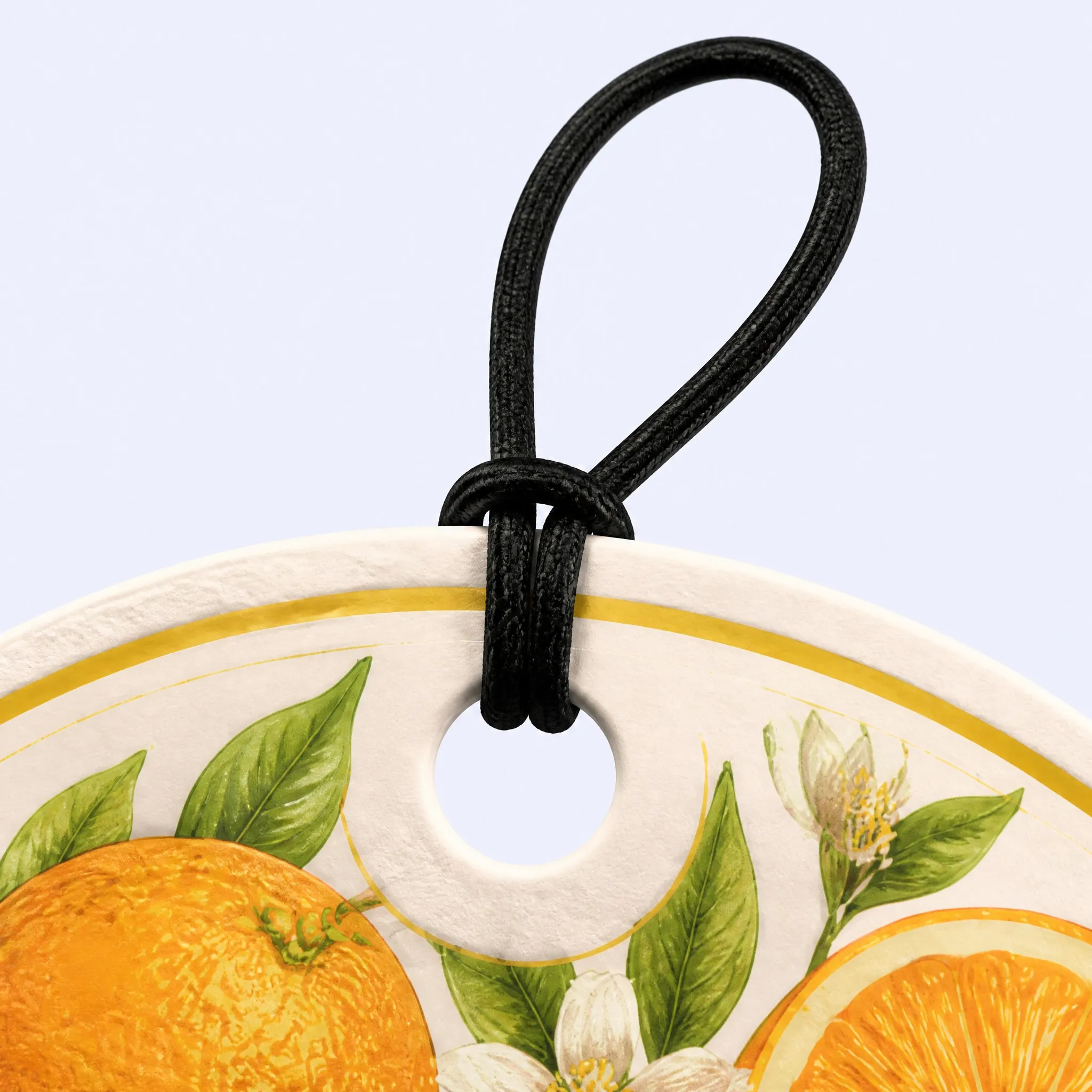 Top Detail of Citrus Air Freshener with Elastic Cord Loop and Orange Blossom Artwork