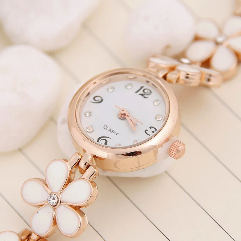 

Promotion Free shipping Fashion Daisies Flower Rose Gold Bracelet Wristwatch Women Girl watches JS07