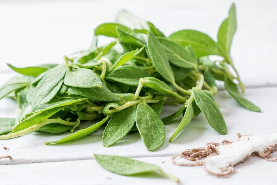 Fresh sage leaves on a wooden board