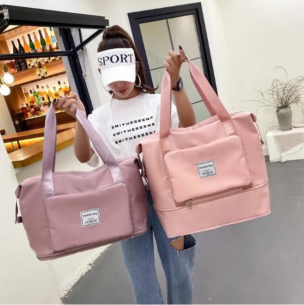 

Fashion New Customized Logo Large Capacity Pink Duffle Bags Gym Man Women Waterproof Sports Travel Duffel Bag for women