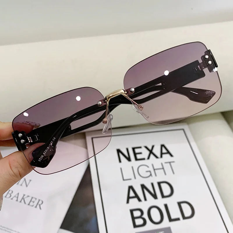 

China Factory Wholesale Fashion Women Rimless sun glasses