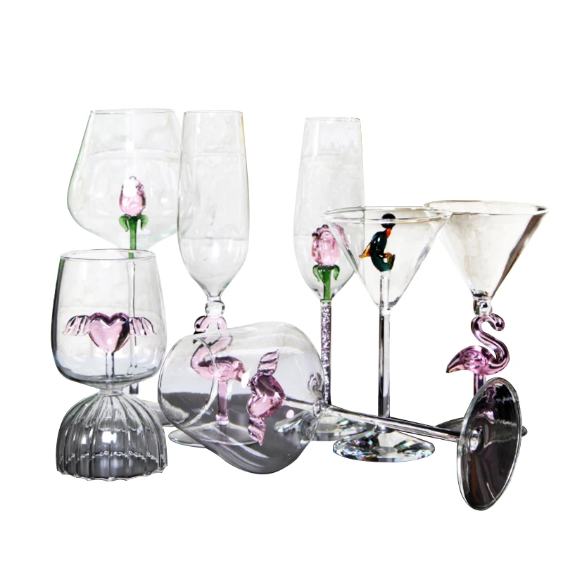 

There are pink rose crystal glass goblets in the creative design red wine glasses for wedding parties