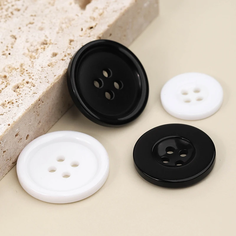 

Factory direct sale shirt cuff collar four-eye button black and white wide-rim resin button