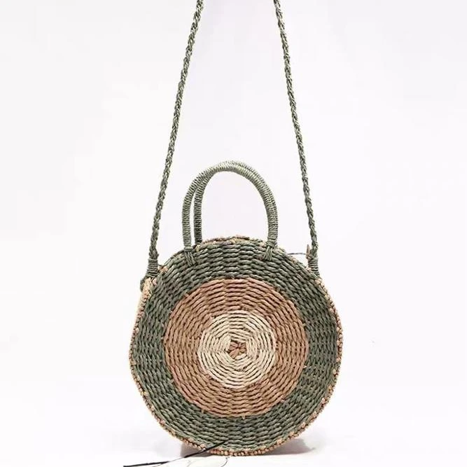 

Hot wholesale low price women's fashion beautiful straw beach bag hand-woven bag, According to customer's requirements