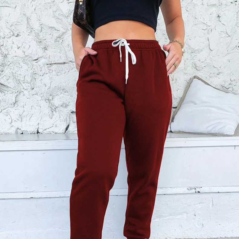 

Customized LOGO plus size women's solid color sports trousers, leisure girdled feet, thickened sweater