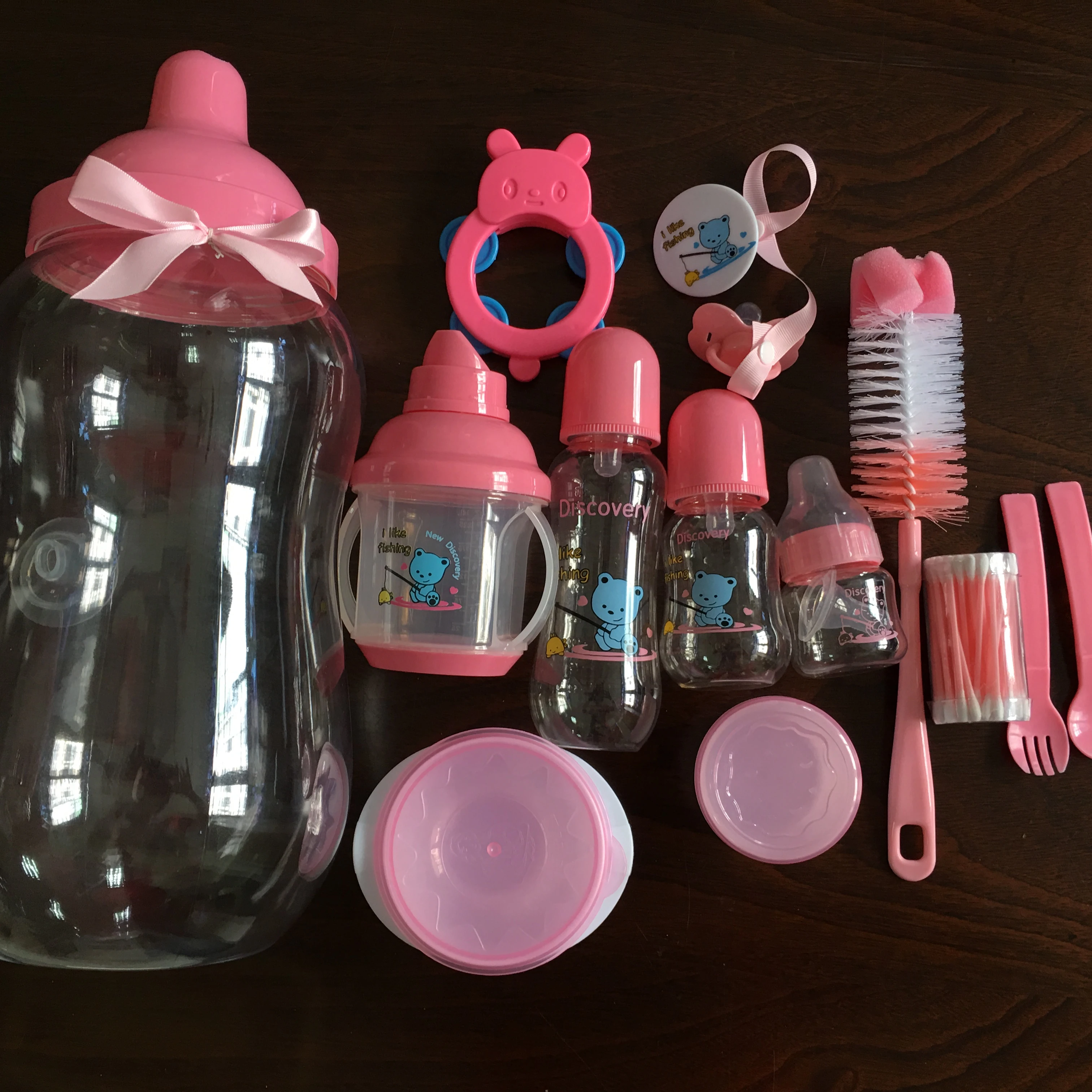 

Cheap baby bank baby feeding bottle with toys, Pink.green.blue