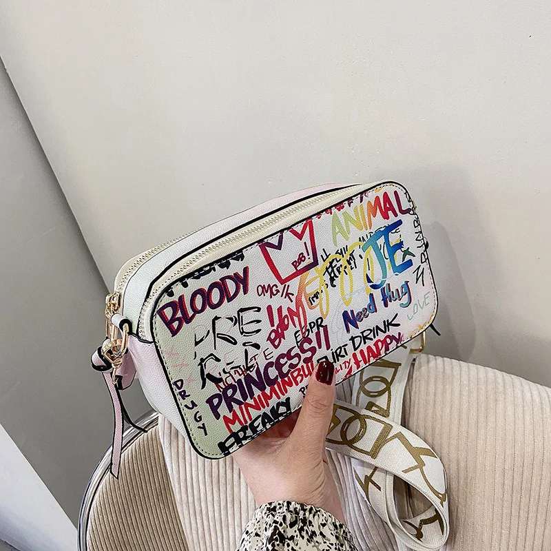 

2021 latest ladies spring fancy women purses 8806 graffiti handbags for girls