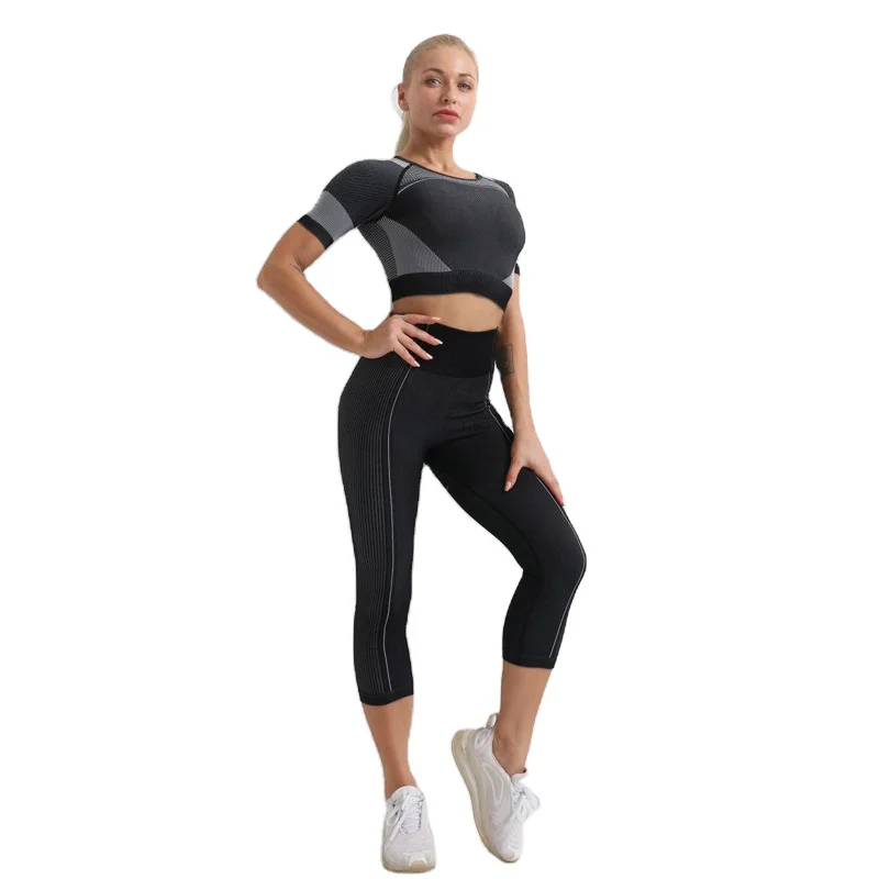 

Seamless knitted yoga wear pink hip sports cropped trousers hollow tight yoga short-sleeved top