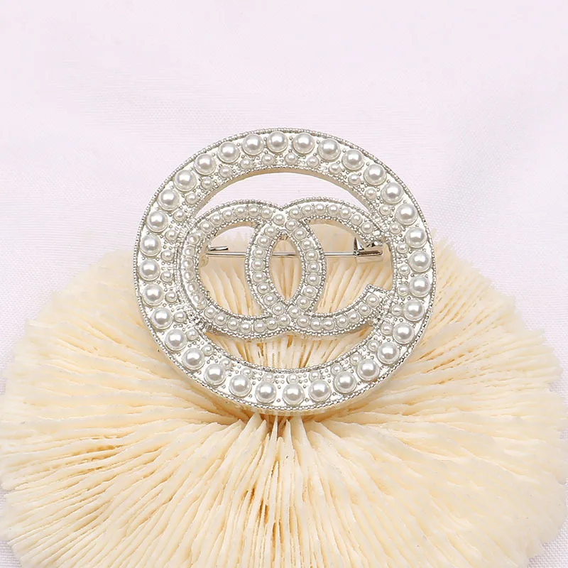 

Rhinestone Designer Charms Factory Wholesale Fashion brand logo Pin Brooch
