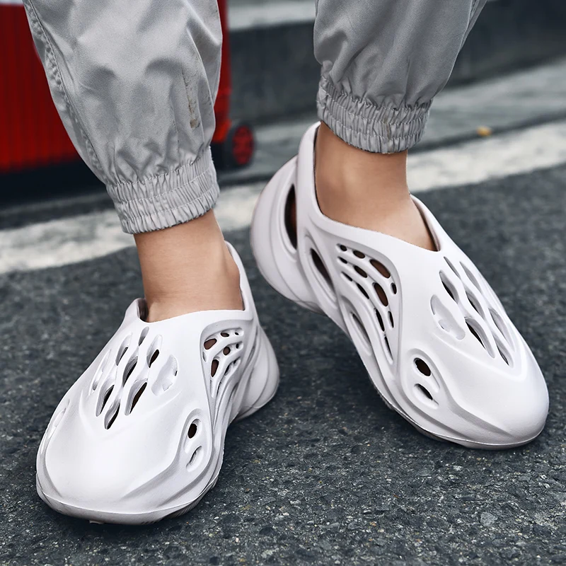 

Hot selling fashion unisex yeezy comfortable falt slip-on beach sandals