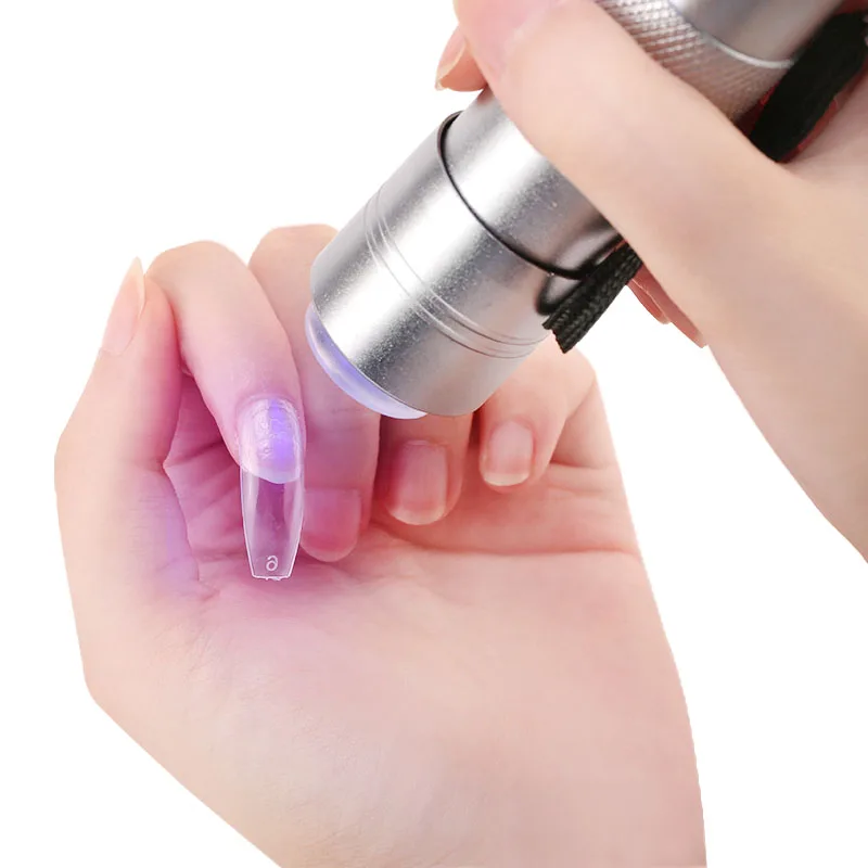 

New Products for 2022 Flashlight LED Lamp Mini Nails Dryer with Soft Silicone Seal Stamper Press Nails Art Decoration UV Light