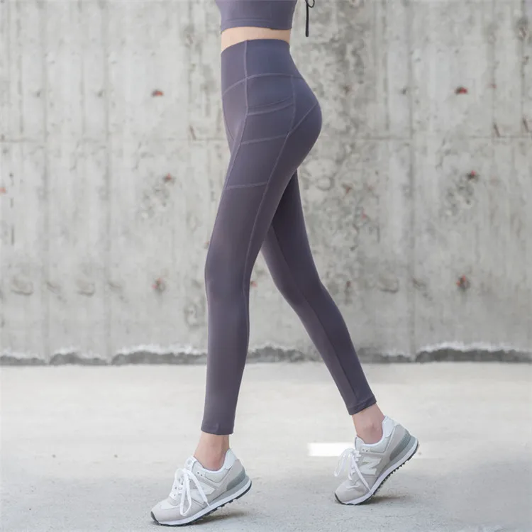 

High Waist Yoga Pants With Pockets Women Wear Running Stretch Nine-point Pants Tight Eco Yoga Pants For Women
