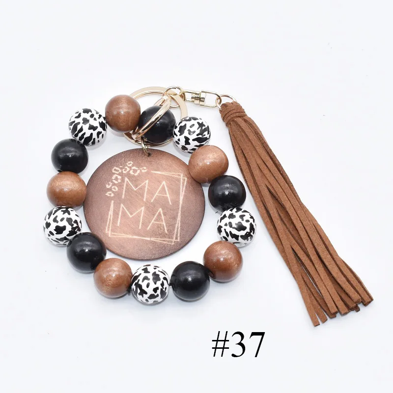 

Cow patterns wooden ball mixed brown black beads elastic bracelet monogram MAMA bracelet keychain