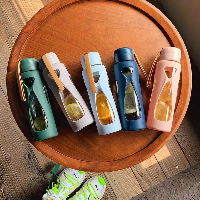 

Mikenda glass water bottle with silicone sleeve drinking custom logo glass bottle of water, As picture
